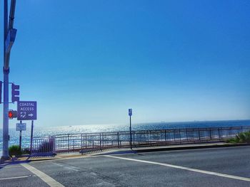 View of sea against clear blue sky