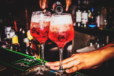 Close-up of hand holding wine glass