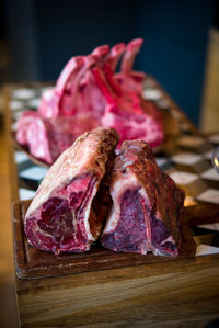 Close-up of meat on cutting board