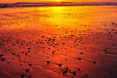 Scenic view of sea at sunset