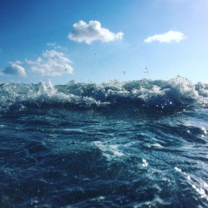 Scenic view of sea against blue sky