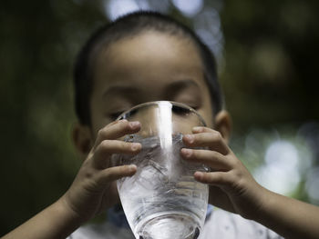 Close-up of human hand holding drink