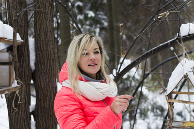 Portrait of young woman in winter