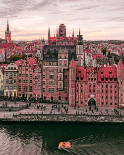 View of buildings in city at waterfront