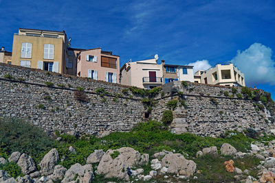 Low angle view of buildings against sky