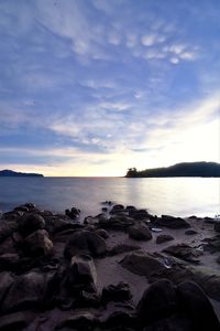 Scenic view of sea against sky at sunset