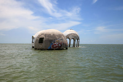 Ship in sea against sky