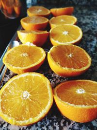 Close-up of orange slices on table