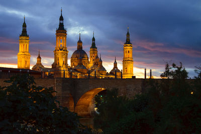 View of historic building against sky at dusk