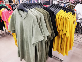 A departmental store in calcutta is displaying men's t-shirts for sale.