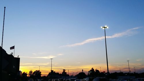 Low angle view of street light against sky at night