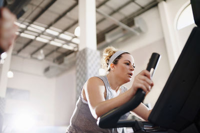 Woman exercising at gym