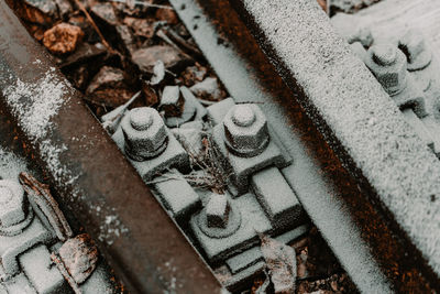 High angle view of rusty metal on snow