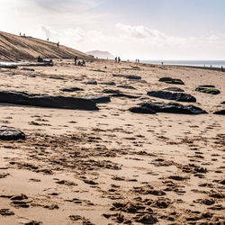 Scenic view of beach against sky