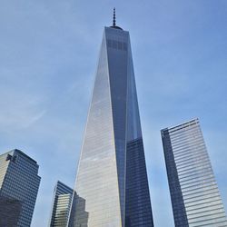 Low angle view of skyscrapers against sky