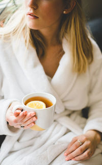 Woman holding tea cup