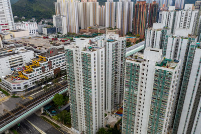 High angle view of street amidst buildings in city