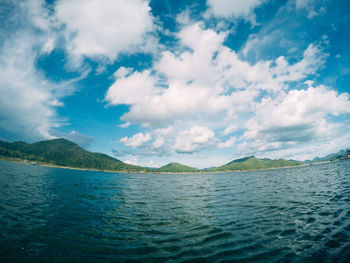 Scenic view of sea against blue sky