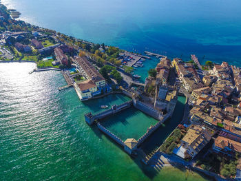 High angle view of townscape amidst sea