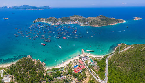 High angle view of bay against clear blue sky