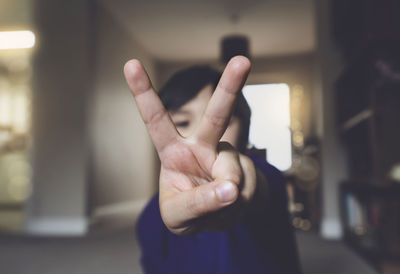 Close-up of boy gesturing