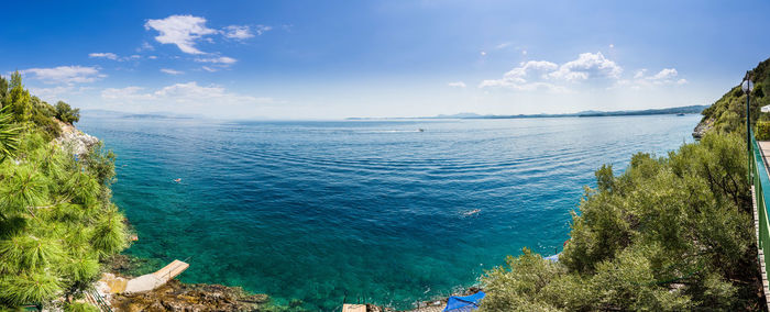 High angle view of sea against blue sky