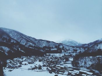 Scenic view of snow covered mountains