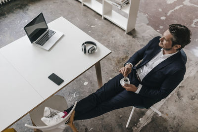 Businessman having a coffee break