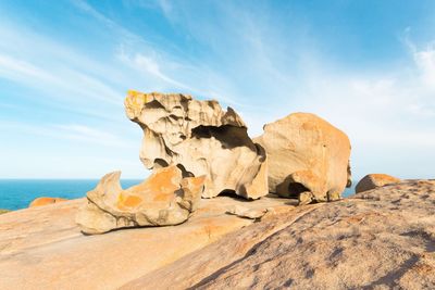 Scenic view of mountains against cloudy sky