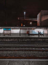 Train at railroad station at night