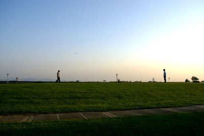 Scenic view of grassy field