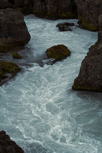 Fast mountain river between cliffs landscape photo