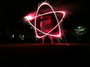 Firework display at night