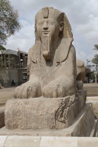 Statue of historical building against sky