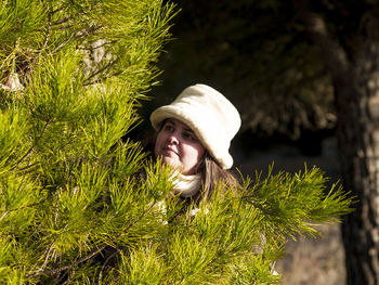 Woman by branch