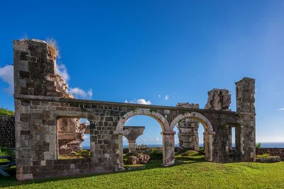 Old ruins against blue sky