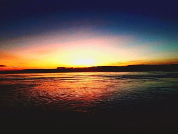 Scenic view of dramatic sky over sea