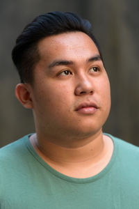 Close-up portrait of serious young man