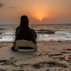 Scenic view of sea at sunset