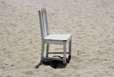 High angle view of chair on beach