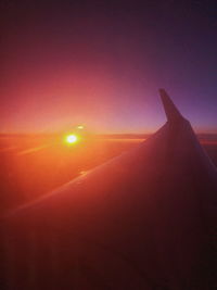 Scenic view of landscape against sky during sunset