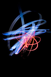 Light painting against black background