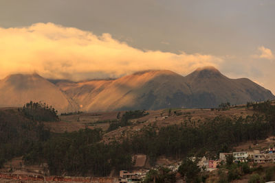 Scenic view of landscape against sky during sunset