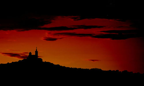 Silhouette of temple during sunset