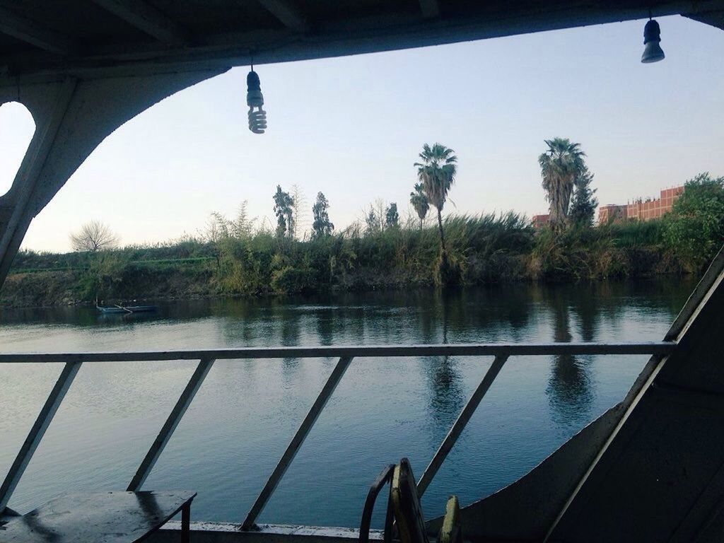 tree, water, river, architecture, bridge - man made structure, built structure, no people, nature, sky, day, outdoors