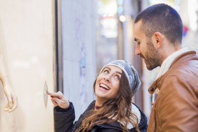 Happy young couple in the city