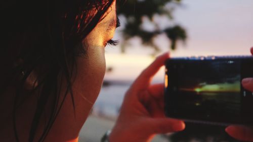 Close-up of woman face photographing outdoors