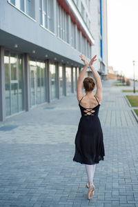 Full length of woman standing outdoors