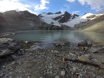 Scenic view of snowcapped mountains against sky