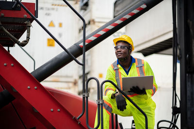 Man working with umbrella